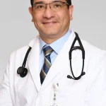 Carlos Vela Brol, M.D.