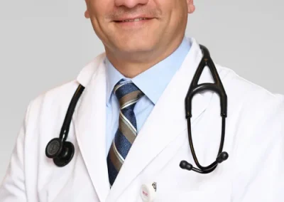 Carlos Vela Brol, M.D.